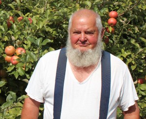 Wellwood Orchard owner Roy Mark stands by his Honeycrisp. (Bar Lois Weeks photo)