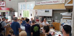 The New England Apples booth in the Massachusetts Building at the Big E in West Springfield, Massachusetts. (Russell Steven Powell)