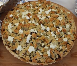 An unusual savory pie featured bits of goat cheese on top. (Russell Steven Powell)